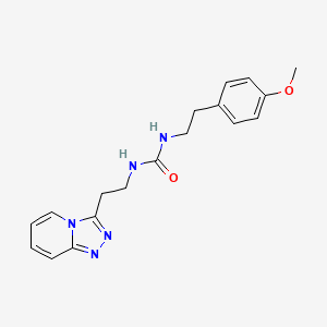 molecular formula C18H21N5O2 B1187013 1-[2-(4-Methoxyphenyl)ethyl]-3-[2-([1,2,4]triazolo[4,3-a]pyridin-3-yl)ethyl]urea 