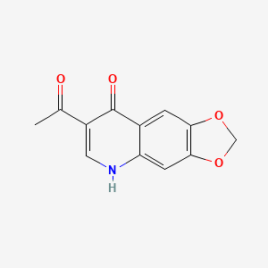 molecular formula C12H9NO4 B11878055 1,3-Dioxolo(4,5-g)quinolin-8(5H)-one, 7-acetyl- CAS No. 34841-19-5