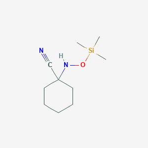 1-{[(Trimethylsilyl)oxy]amino}cyclohexane-1-carbonitrile