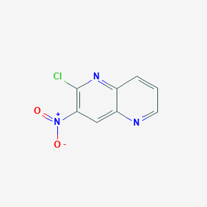 molecular formula C8H4ClN3O2 B11894699 2-Chloro-3-nitro-1,5-naphthyridine CAS No. 74919-33-8