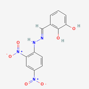 molecular formula C13H10N4O6 B1189740 3-[(2,4-Dinitro-phenyl)-hydrazonomethyl]-benzene-1,2-diol 