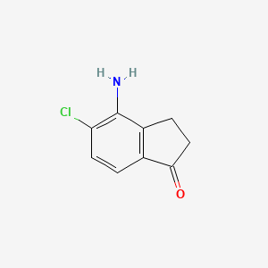 4-Amino-5-chloro-2,3-dihydroinden-1-one