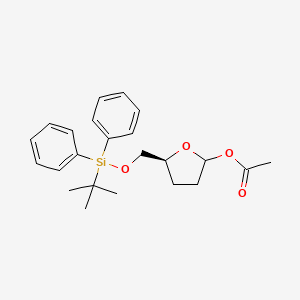 (5S)-5-({[tert-butyl(diphenyl)silyl]oxy}methyl)tetrahydro-2-furanyl acetate