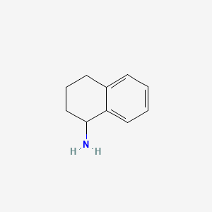 molecular formula C10H13N B1195953 1,2,3,4-Tetrahydro-1-naphthylamine CAS No. 2217-40-5