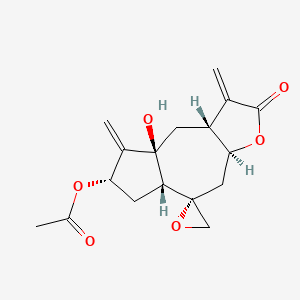 molecular formula C17H20O6 B1198917 [(3aS,5S,5aR,7S,8aS,9aR)-8a-hydroxy-1,8-dimethylidene-2-oxospiro[4,5a,6,7,9,9a-hexahydro-3aH-azuleno[6,5-b]furan-5,2'-oxirane]-7-yl] acetate 
