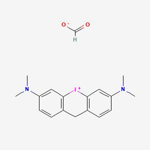 molecular formula C18H21IN2O2 B1199254 5-N,5-N,13-N,13-N-tetramethyl-2-iodoniatricyclo[8.4.0.03,8]tetradeca-1(10),3(8),4,6,11,13-hexaene-5,13-diamine;formate CAS No. 54593-51-0