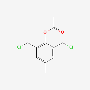 molecular formula C11H12Cl2O2 B12000698 2,6-Bis(chloromethyl)-p-tolyl acetate 