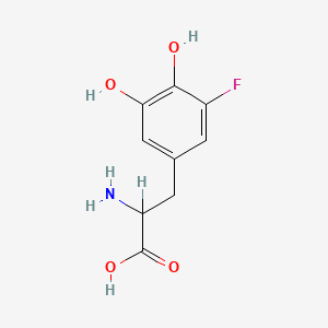 B1203197 2-Amino-3-(3-fluoro-4,5-dihydroxyphenyl)propanoic acid CAS No. 60872-09-5