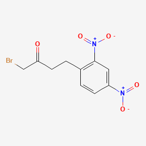 B1203638 1-Bromo-4-(2,4-dinitrophenyl)butan-2-one CAS No. 23043-37-0