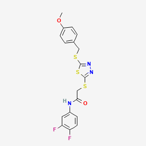 N-(3,4-difluorophenyl)-2-({5-[(4-methoxybenzyl)sulfanyl]-1,3,4-thiadiazol-2-yl}sulfanyl)acetamide