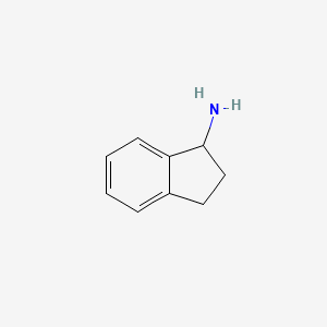 molecular formula C9H11N B1206342 1-氨基茚 CAS No. 34698-41-4