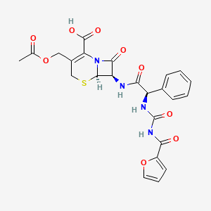 B1207673 7-((3-(2-Furoyl)ureido)phenylacetamido)cephalosporanic acid CAS No. 97965-20-3