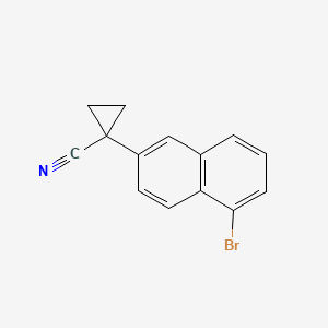 1-(5-Bromonaphthalen-2-YL)cyclopropane-1-carbonitrile