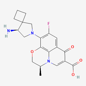 B1208047 (2S)-6-[(8S)-8-Amino-6-azaspiro[3.4]octan-6-yl]-7-fluoro-2-methyl-10-oxo-4-oxa-1-azatricyclo[7.3.1.05,13]trideca-5(13),6,8,11-tetraene-11-carboxylic acid CAS No. 129321-78-4