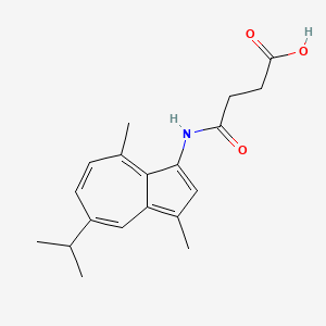 B1208065 Succinic acid mono-3-guaiazulenamide CAS No. 69174-75-0