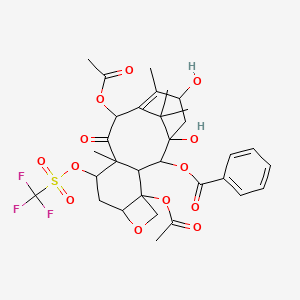 [4,12-Diacetyloxy-1,15-dihydroxy-10,14,17,17-tetramethyl-11-oxo-9-(trifluoromethylsulfonyloxy)-6-oxatetracyclo[11.3.1.03,10.04,7]heptadec-13-en-2-yl] benzoate