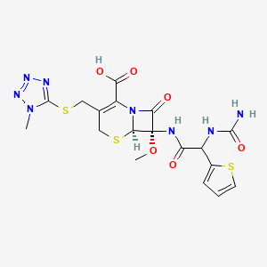molecular formula C18H20N8O6S3 B1209487 (6R,7S)-7-[[2-(carbamoylamino)-2-thiophen-2-ylacetyl]amino]-7-methoxy-3-[(1-methyltetrazol-5-yl)sulfanylmethyl]-8-oxo-5-thia-1-azabicyclo[4.2.0]oct-2-ene-2-carboxylic acid CAS No. 65700-47-2