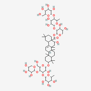 molecular formula C64H104O30 B1209922 [3-[3,4-二羟基-6-甲基-5-[3,4,5-三羟基-6-(羟甲基)氧杂环-2-基]氧氧杂环-2-基]氧-4,5-二羟基氧杂环-2-基] 5-羟基-10-[3-羟基-6-(羟甲基)-4-(3,4,5-三羟基-6-甲基氧杂环-2-基)氧-5-(3,4,5-三羟基氧杂环-2-基)氧氧杂环-2-基]氧-2,2,6a,6b,9,9,12a-七甲基-1,3,4,5,6,6a,7,8,8a,10,11,12,13,14b-十四氢茚满-4a-甲酸酯 CAS No. 139077-64-8
