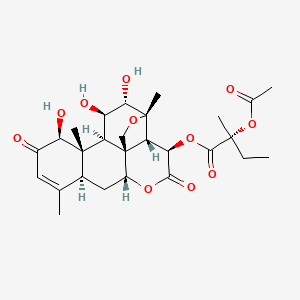 molecular formula C27H36O11 B1212236 [(1R,2S,3R,6R,8S,12S,13S,14R,15R,16S,17S)-12,15,16-三羟基-9,13,17-三甲基-4,11-二氧代-5,18-二氧杂五环[12.5.0.01,6.02,17.08,13]十九碳-9-烯-3-基] (2R)-2-乙酰氧基-2-甲基丁酸酯 CAS No. 59938-97-5
