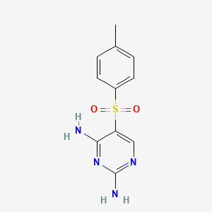 5-(4-Methylphenyl)sulfonylpyrimidine-2,4-diamine