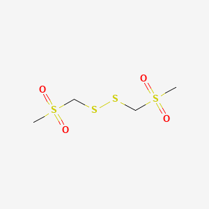 molecular formula C4H10O4S4 B1213023 二（甲磺酰基）甲基二硫化物 CAS No. 74963-70-5