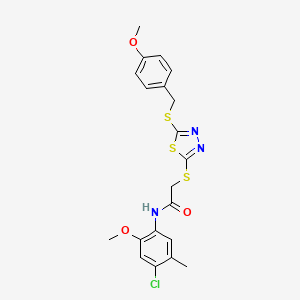 N-(4-chloro-2-methoxy-5-methylphenyl)-2-[(5-{[(4-methoxyphenyl)methyl]sulfanyl}-1,3,4-thiadiazol-2-yl)sulfanyl]acetamide