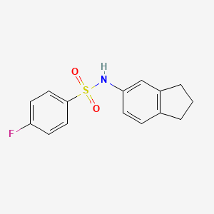 molecular formula C15H14FNO2S B12158257 [(4-Fluorophenyl)sulfonyl]indan-5-ylamine 