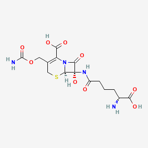 molecular formula C15H20N4O9S B1215883 7a-Hydroxy-o-carbamoyl-deacetylcephalosporin C 