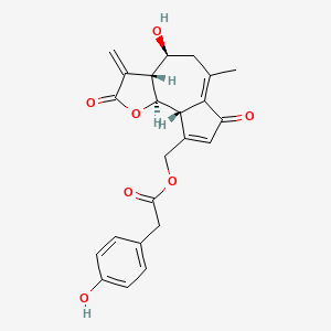 molecular formula C23H22O7 B1217142 [(3aR,4S,9aS,9bR)-4-hydroxy-6-methyl-3-methylidene-2,7-dioxo-4,5,9a,9b-tetrahydro-3aH-azuleno[8,7-b]furan-9-yl]methyl 2-(4-hydroxyphenyl)acetate CAS No. 6466-74-6
