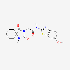 molecular formula C19H22N4O4S B12173374 N-(6-methoxybenzo[d]thiazol-2-yl)-2-(1-methyl-2,4-dioxo-1,3-diazaspiro[4.5]decan-3-yl)acetamide 