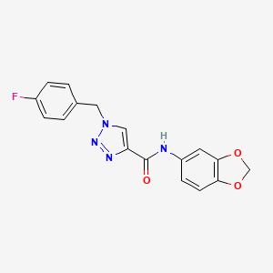 molecular formula C17H13FN4O3 B1218134 N-(1,3-benzodioxol-5-yl)-1-[(4-fluorophenyl)methyl]-4-triazolecarboxamide 