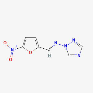 molecular formula C7H5N5O3 B1218880 1-(((5-Nitro-2-furyl)methylene)amino)-1,2,4-triazole CAS No. 111041-97-5