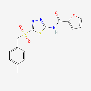 molecular formula C15H13N3O4S2 B12197683 N-(5-((4-methylbenzyl)sulfonyl)-1,3,4-thiadiazol-2-yl)furan-2-carboxamide 