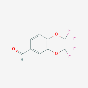 molecular formula C9H4F4O3 B121985 2,2,3,3-四氟-1,4-苯并二氧杂环己烷-6-甲醛 CAS No. 159276-63-8