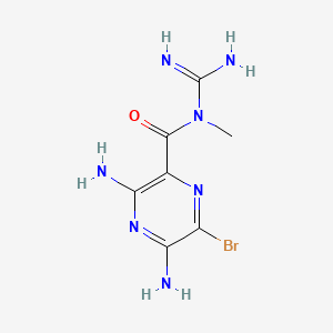 molecular formula C7H10BrN7O B1221320 3,5-Diamino-N-(aminoiminomethyl)-6-bromopyrazine-N-methylcarboxamide CAS No. 98299-53-7