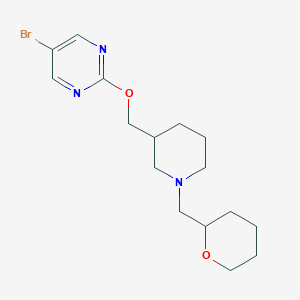 5-Bromo-2-({1-[(oxan-2-yl)methyl]piperidin-3-yl}methoxy)pyrimidine