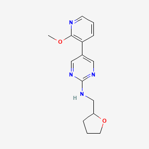 5-(2-methoxypyridin-3-yl)-N-[(oxolan-2-yl)methyl]pyrimidin-2-amine