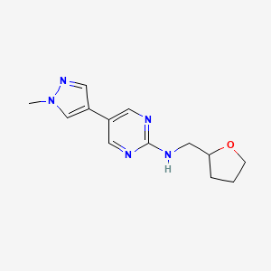 molecular formula C13H17N5O B12227931 5-(1-methyl-1H-pyrazol-4-yl)-N-[(oxolan-2-yl)methyl]pyrimidin-2-amine 