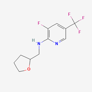 molecular formula C11H12F4N2O B12228384 3-fluoro-N-[(oxolan-2-yl)methyl]-5-(trifluoromethyl)pyridin-2-amine 