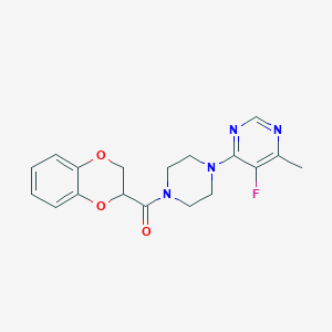 4-[4-(2,3-Dihydro-1,4-benzodioxine-2-carbonyl)piperazin-1-yl]-5-fluoro-6-methylpyrimidine