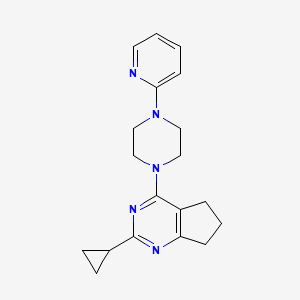 1-{2-cyclopropyl-5H,6H,7H-cyclopenta[d]pyrimidin-4-yl}-4-(pyridin-2-yl)piperazine