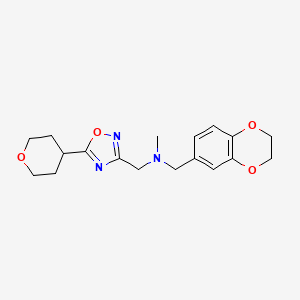 [(2,3-Dihydro-1,4-benzodioxin-6-yl)methyl](methyl){[5-(oxan-4-yl)-1,2,4-oxadiazol-3-yl]methyl}amine