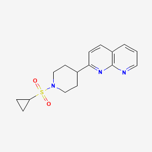 molecular formula C16H19N3O2S B12240807 2-[1-(Cyclopropanesulfonyl)piperidin-4-yl]-1,8-naphthyridine 