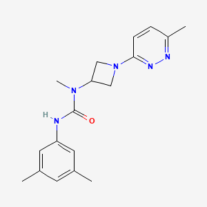 molecular formula C18H23N5O B12241061 1-(3,5-Dimethylphenyl)-3-methyl-3-[1-(6-methylpyridazin-3-yl)azetidin-3-yl]urea 