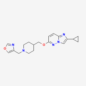 molecular formula C19H23N5O2 B12241980 4-[({2-Cyclopropylimidazo[1,2-b]pyridazin-6-yl}oxy)methyl]-1-[(1,3-oxazol-4-yl)methyl]piperidine 