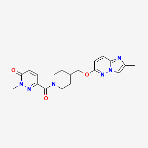 molecular formula C19H22N6O3 B12243129 2-Methyl-6-{4-[({2-methylimidazo[1,2-b]pyridazin-6-yl}oxy)methyl]piperidine-1-carbonyl}-2,3-dihydropyridazin-3-one 