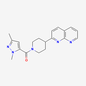 2-[1-(1,3-dimethyl-1H-pyrazole-5-carbonyl)piperidin-4-yl]-1,8-naphthyridine