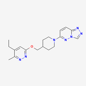 molecular formula C18H23N7O B12245929 4-Ethyl-3-methyl-6-[(1-{[1,2,4]triazolo[4,3-b]pyridazin-6-yl}piperidin-4-yl)methoxy]pyridazine 