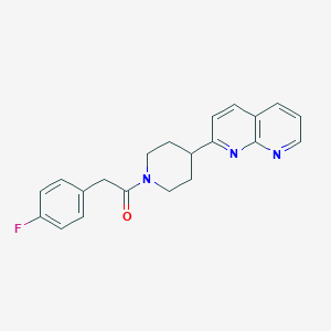 2-(4-Fluorophenyl)-1-[4-(1,8-naphthyridin-2-yl)piperidin-1-yl]ethan-1-one