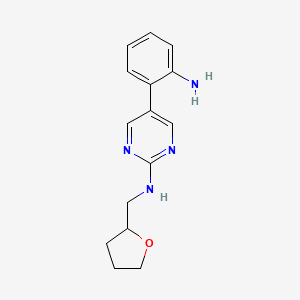 5-(2-aminophenyl)-N-[(oxolan-2-yl)methyl]pyrimidin-2-amine